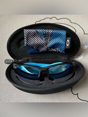 Oakley Black Frame Blue Mirror Lens Sunglasses
